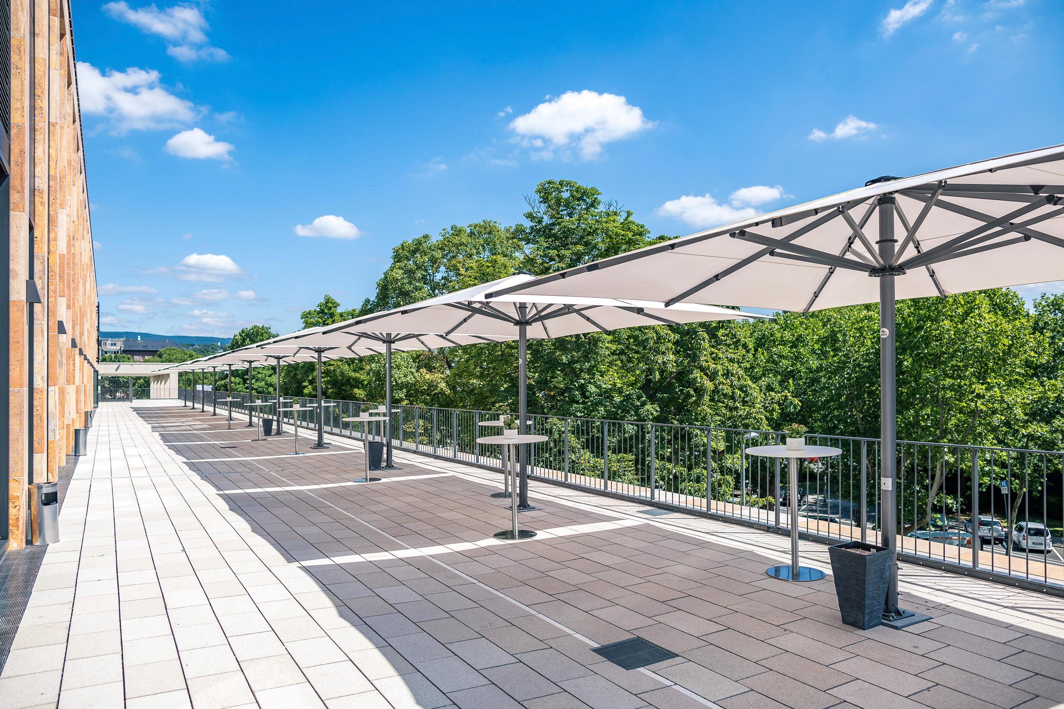 Patio with white parasols